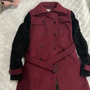 Selling X- small trench jacket color is maroon and black brand is Buffalo  ..